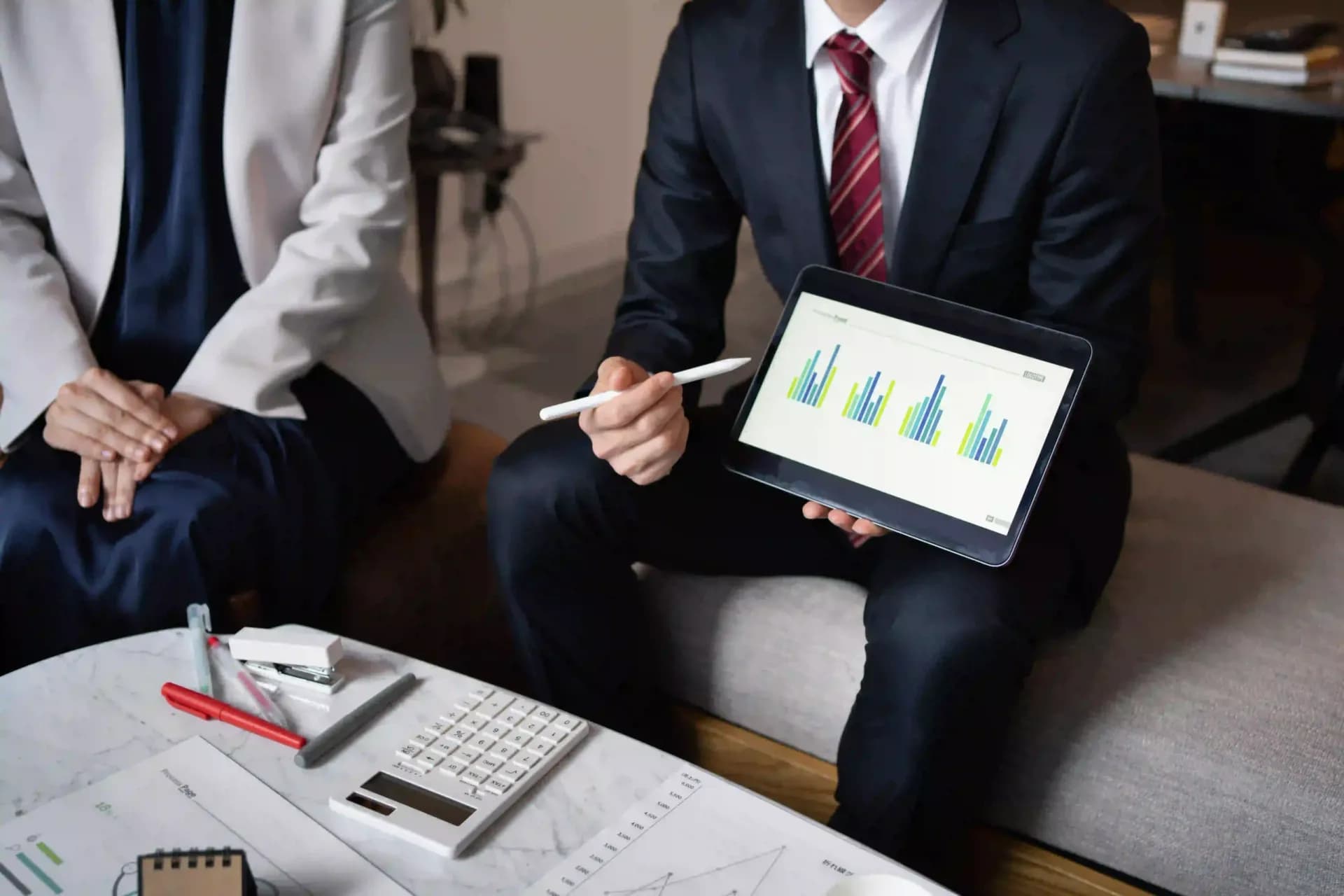 Financial advisor discussing a wealth management plan with a high net worth client in India